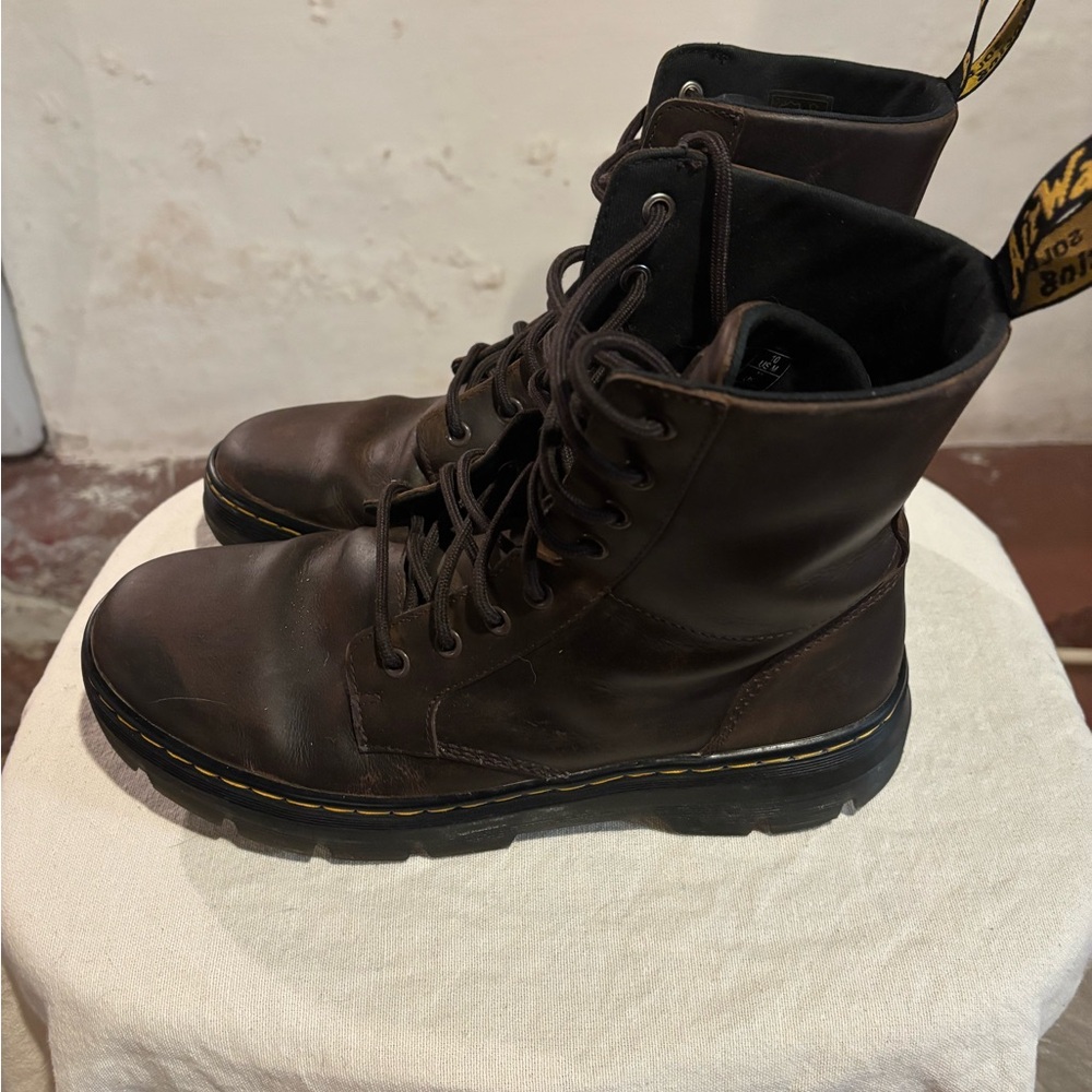 Dr.Martens lace-up boots.